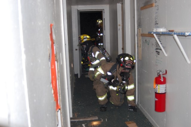 Training at Weekapaug Inn 1/09/08

FF Matt Harris (front) & Lt. Pat Main practice search